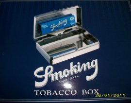 Caja con 6 tabaqueras Smoking + 1 librito Smoking azul dentro de cada una. envio gratis a Peninsula.